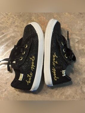 Keds x kate spade new york Kickstart Glitter Sneakers in black with gold script